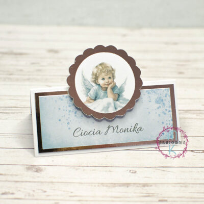 winietka na stół z wystającym elementem z motywem aniołka